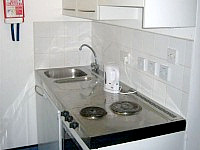 A mini kitchen with all essentials provided